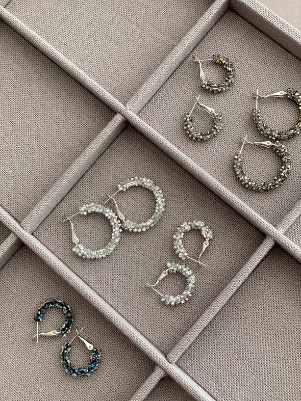 Encrusted Loops in Light Crystal